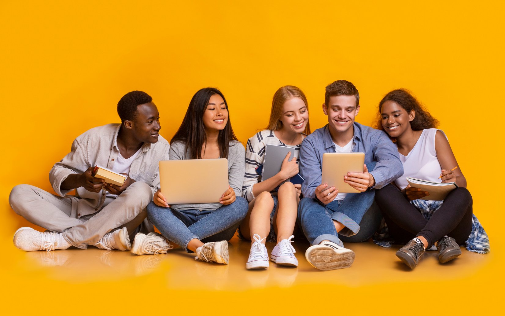 Group of international students studying for university exams